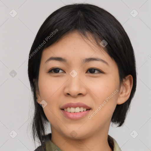 Joyful asian young-adult female with medium  black hair and brown eyes