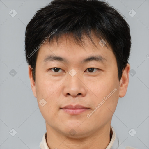 Neutral asian young-adult male with short  brown hair and brown eyes