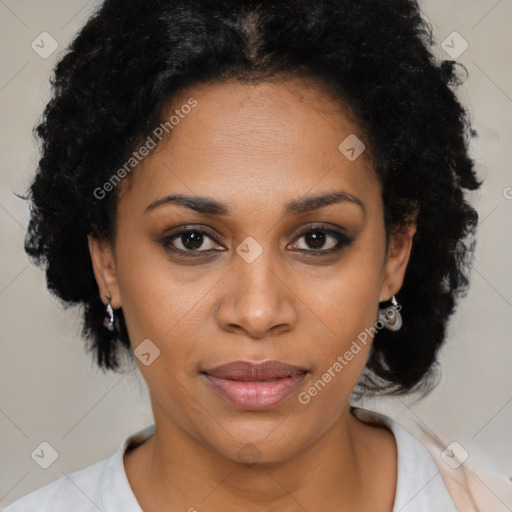 Joyful black young-adult female with medium  black hair and brown eyes