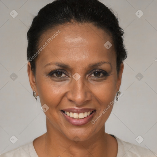 Joyful black adult female with short  brown hair and brown eyes