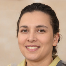 Joyful white young-adult female with medium  brown hair and brown eyes