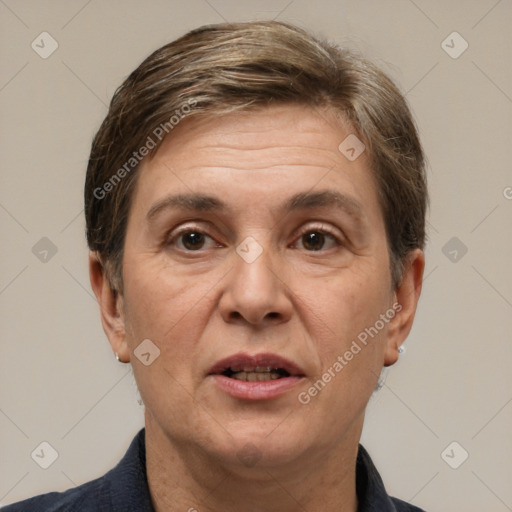 Joyful white adult female with short  brown hair and brown eyes