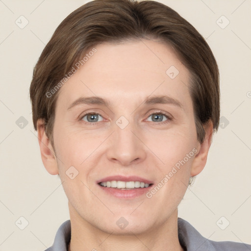 Joyful white young-adult female with short  brown hair and grey eyes