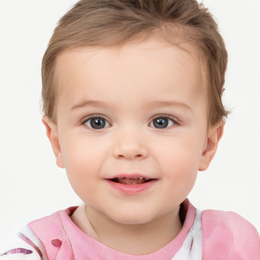 Joyful white child female with short  brown hair and brown eyes