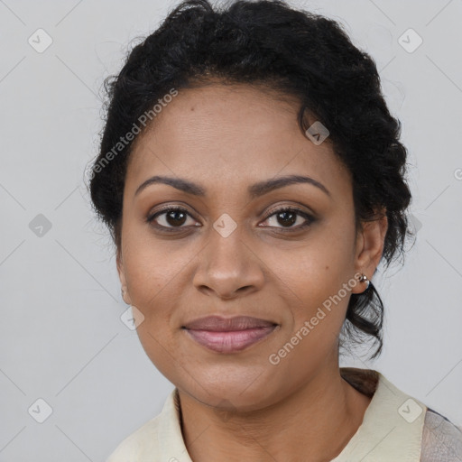 Joyful black adult female with short  brown hair and brown eyes