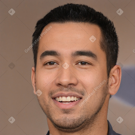 Joyful white young-adult male with short  black hair and brown eyes