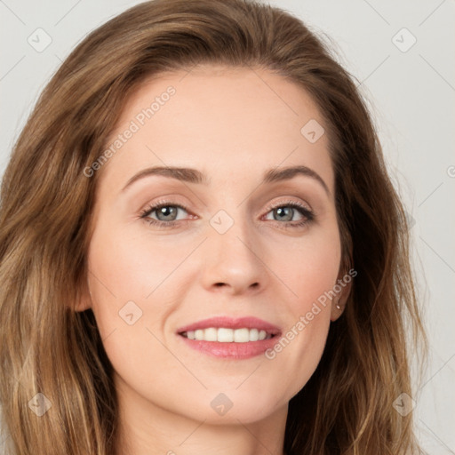 Joyful white young-adult female with long  brown hair and green eyes