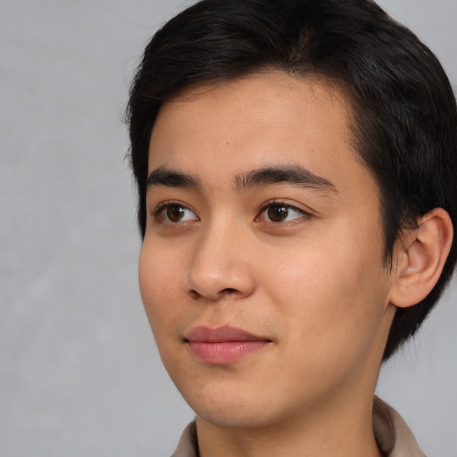 Neutral asian young-adult male with medium  brown hair and brown eyes