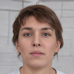 Neutral white young-adult female with short  brown hair and brown eyes