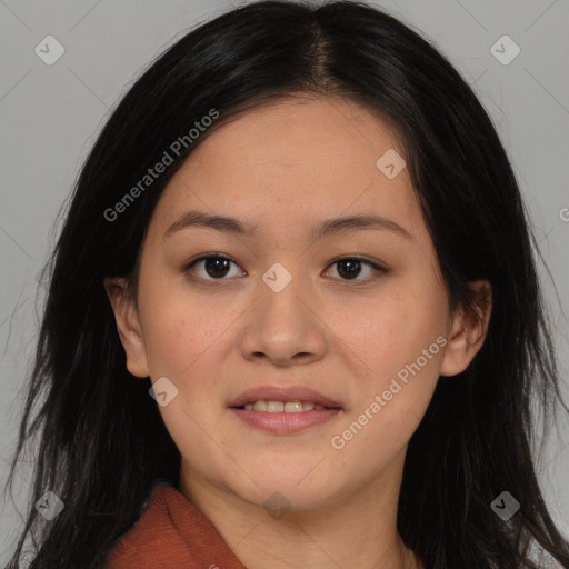 Joyful asian young-adult female with long  brown hair and brown eyes