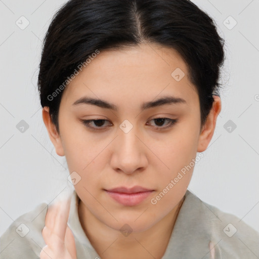 Neutral asian young-adult female with short  brown hair and brown eyes