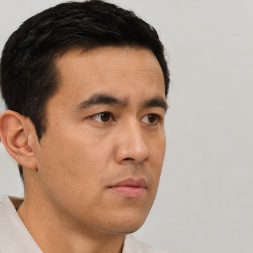 Neutral asian young-adult male with short  black hair and brown eyes