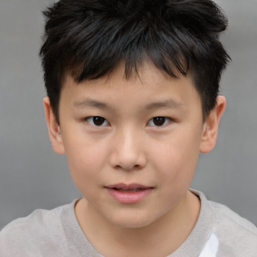 Neutral asian child male with short  brown hair and brown eyes