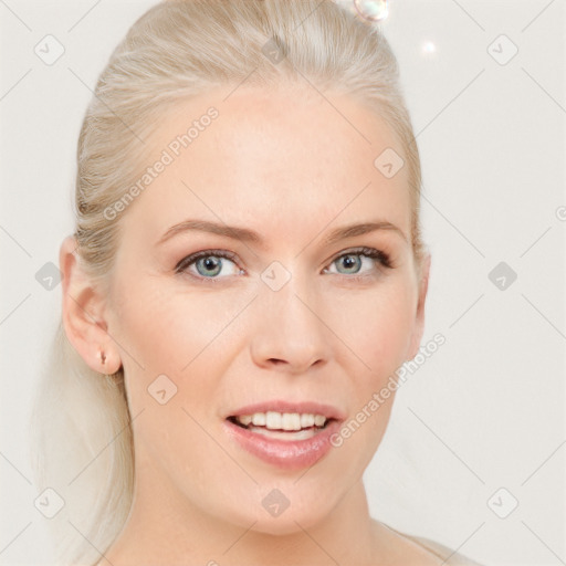 Joyful white young-adult female with medium  brown hair and blue eyes