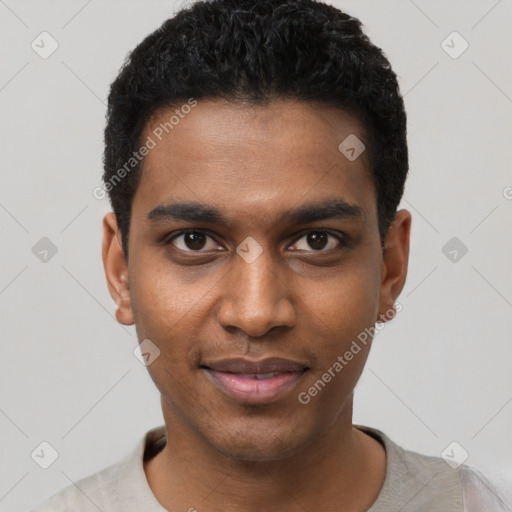 Joyful black young-adult male with short  black hair and brown eyes