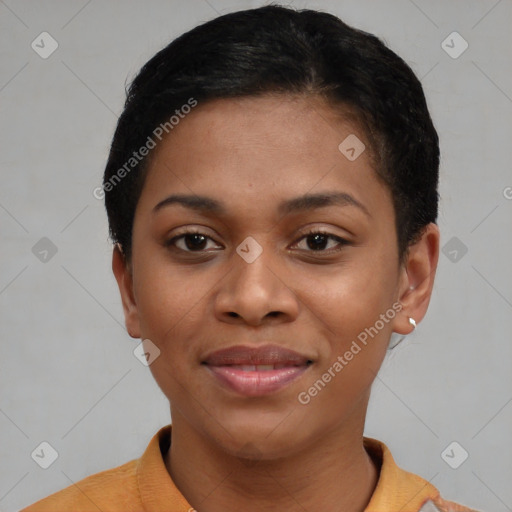 Joyful black young-adult female with short  black hair and brown eyes