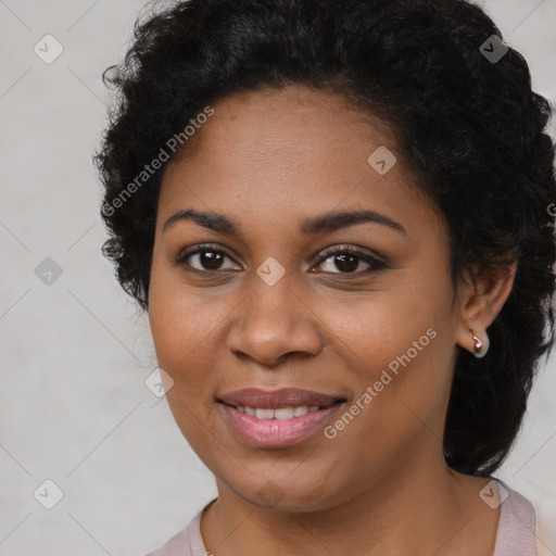 Joyful black young-adult female with long  brown hair and brown eyes