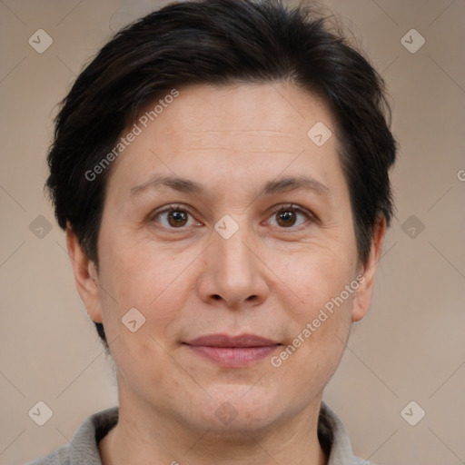 Joyful white adult female with short  brown hair and brown eyes