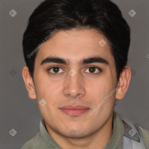 Joyful latino young-adult male with short  brown hair and brown eyes