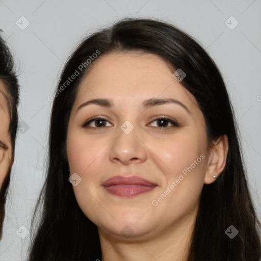 Joyful white adult female with long  brown hair and brown eyes