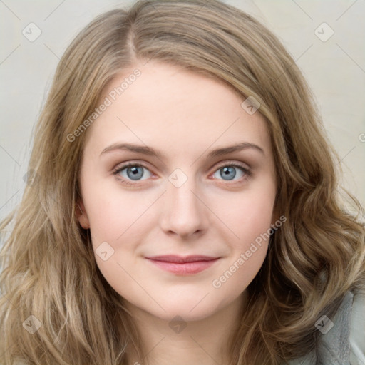 Joyful white young-adult female with long  brown hair and green eyes