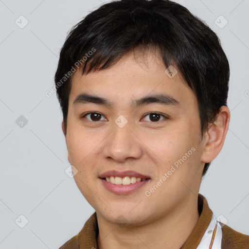 Joyful white young-adult male with short  brown hair and brown eyes