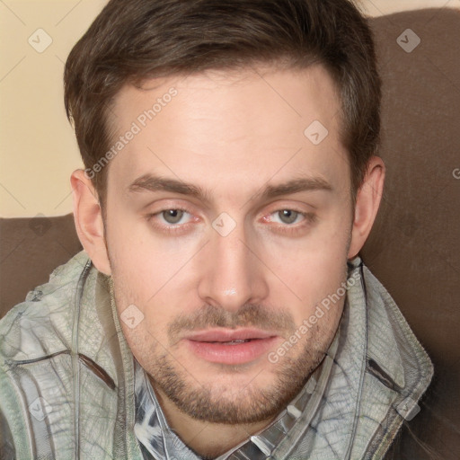 Joyful white adult male with short  brown hair and grey eyes