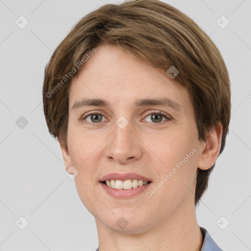 Joyful white young-adult female with short  brown hair and grey eyes