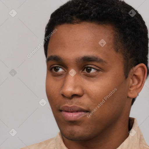 Neutral latino young-adult male with short  black hair and brown eyes