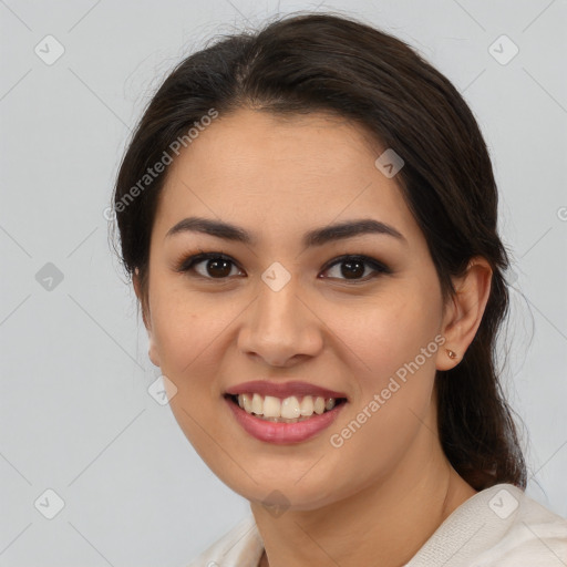 Joyful latino young-adult female with medium  brown hair and brown eyes