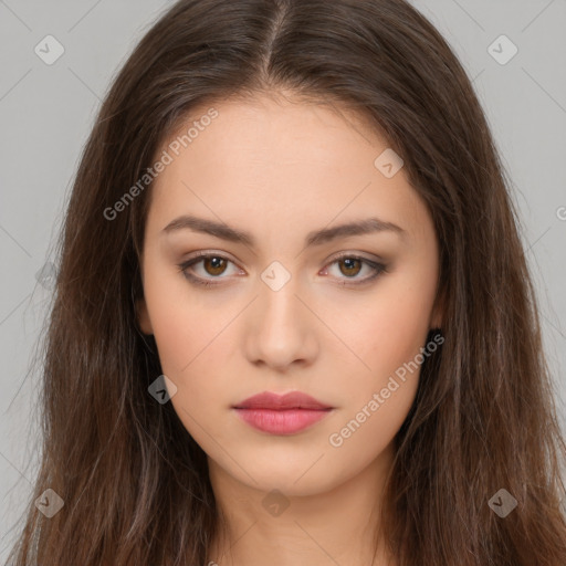 Neutral white young-adult female with long  brown hair and brown eyes