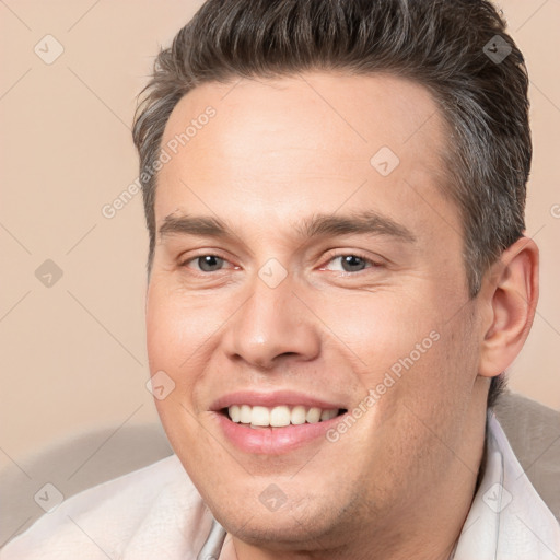 Joyful white young-adult male with short  brown hair and brown eyes