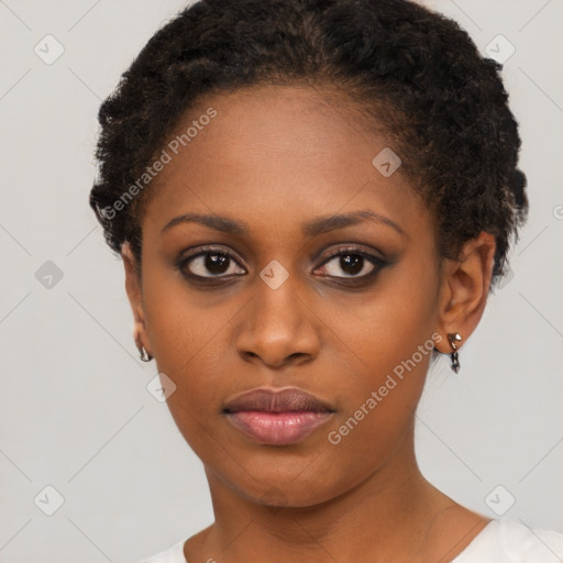 Neutral black young-adult female with short  brown hair and brown eyes