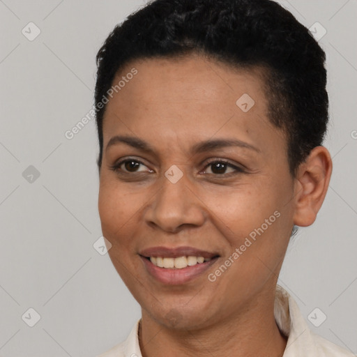 Joyful latino young-adult female with short  brown hair and brown eyes