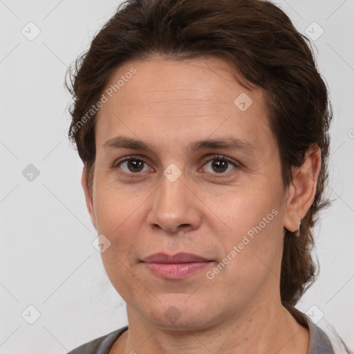 Joyful white adult female with short  brown hair and brown eyes