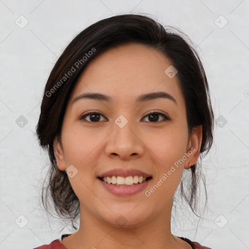 Joyful asian young-adult female with medium  black hair and brown eyes