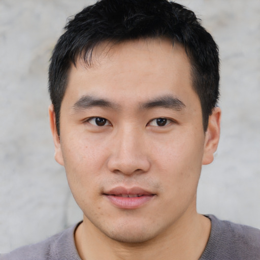 Neutral asian young-adult male with short  black hair and brown eyes