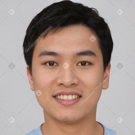 Joyful asian young-adult male with short  black hair and brown eyes