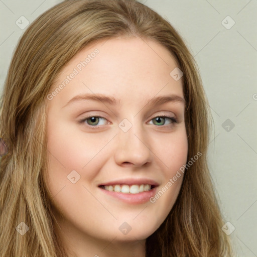 Joyful white young-adult female with long  brown hair and green eyes