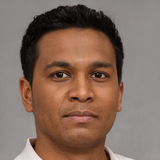 Neutral black young-adult male with short  brown hair and brown eyes