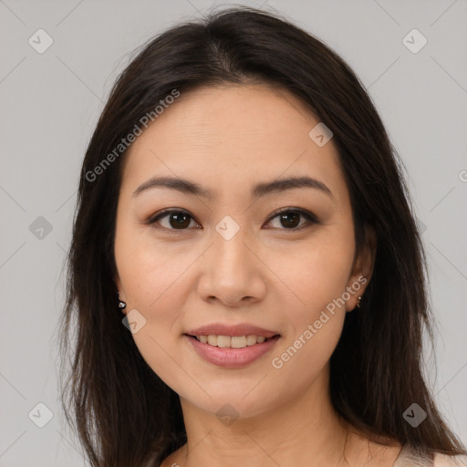 Joyful white young-adult female with long  brown hair and brown eyes