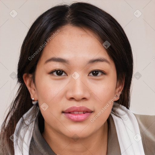 Joyful asian young-adult female with medium  brown hair and brown eyes