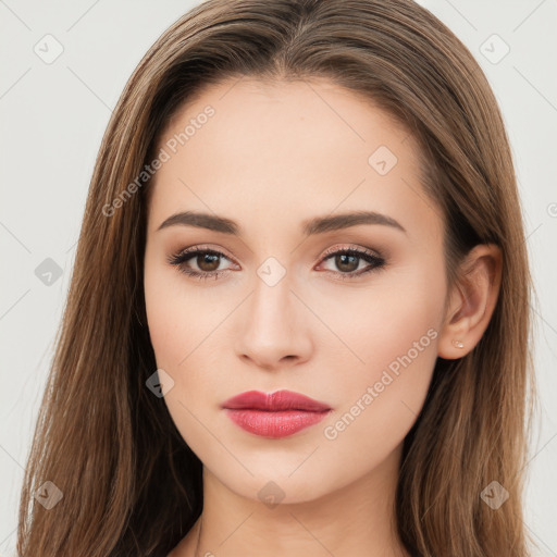 Neutral white young-adult female with long  brown hair and brown eyes