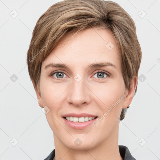 Joyful white young-adult female with short  brown hair and grey eyes