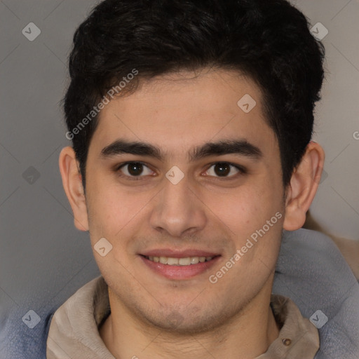 Joyful latino young-adult male with short  brown hair and brown eyes