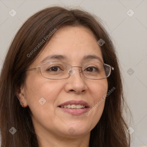 Joyful white adult female with long  brown hair and brown eyes