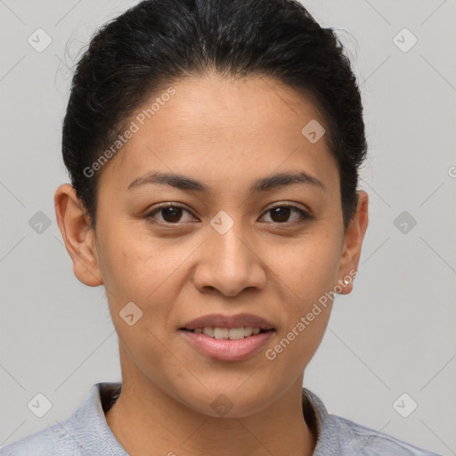 Joyful latino young-adult female with short  brown hair and brown eyes