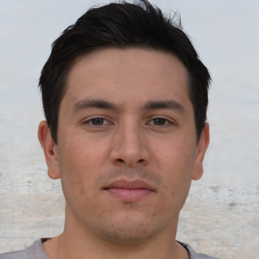 Neutral asian young-adult male with short  brown hair and brown eyes