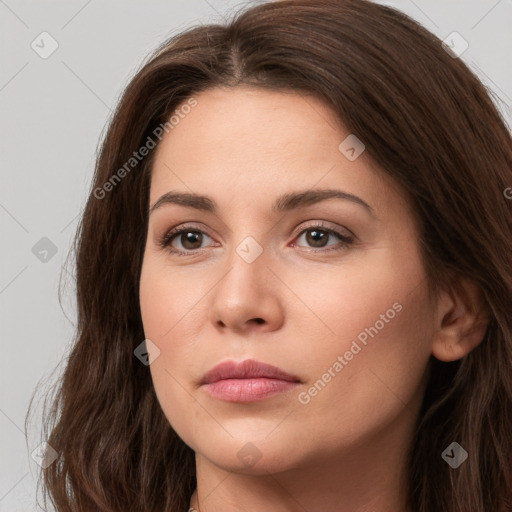 Neutral white young-adult female with long  brown hair and brown eyes