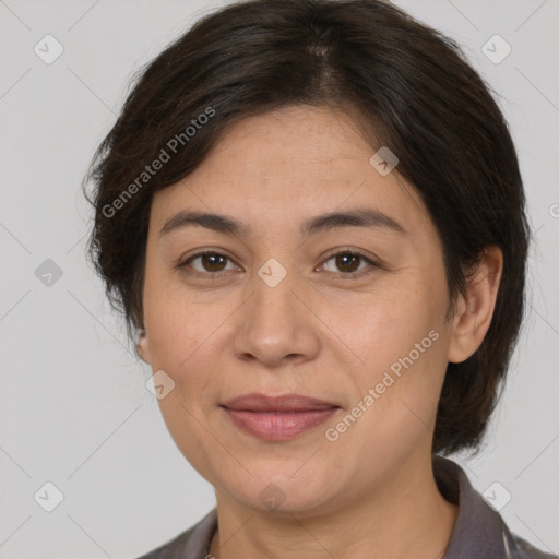 Joyful white adult female with medium  brown hair and brown eyes